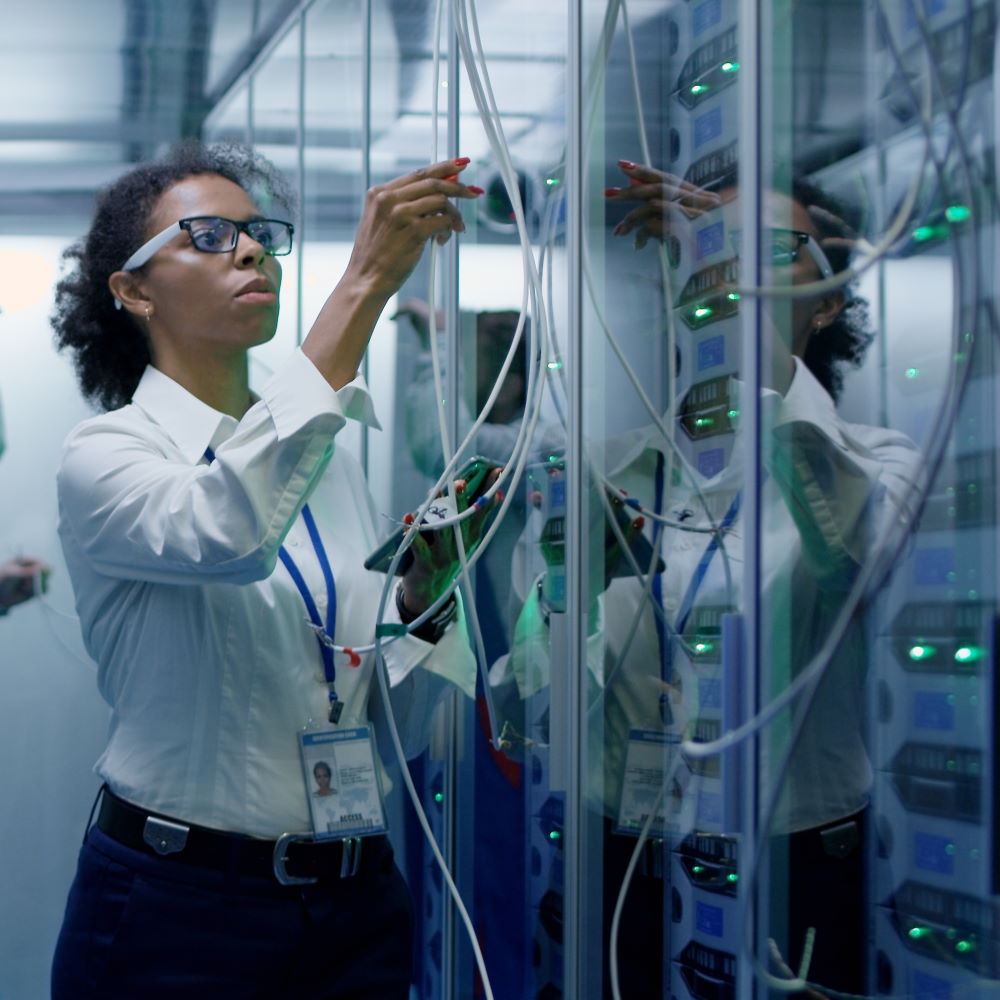 Network engineer assessing server room